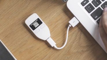Trezor Crypto Wallet Attached To Computer