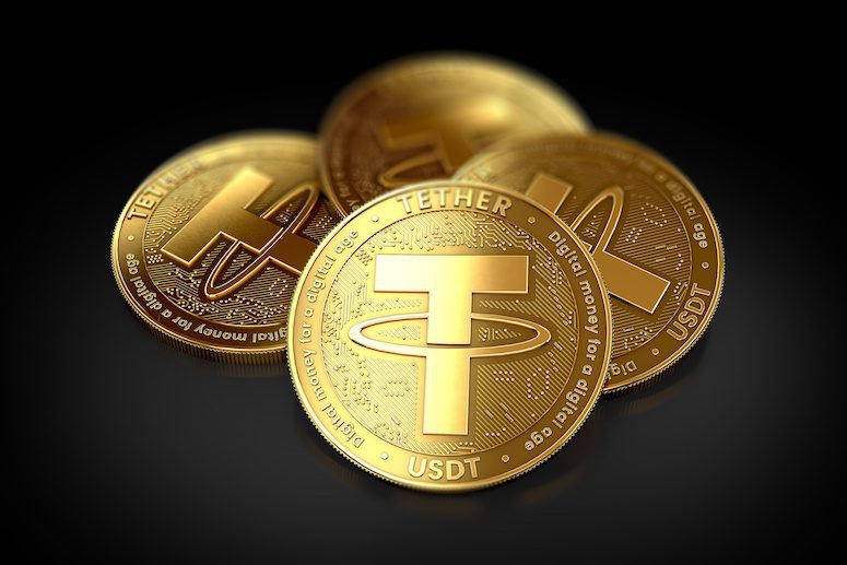 tether coins stacked in gold