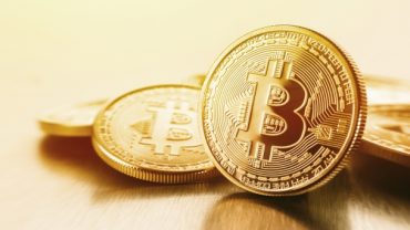 Bitcoin gold coins in currency