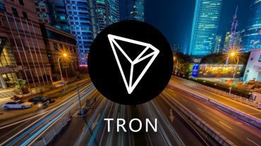 Tron coin on a city street