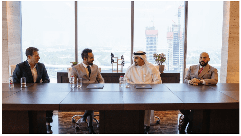 people at an office talking