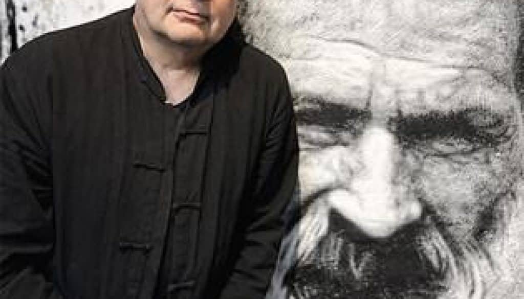 thierry Ehrmann in front of Brancusi’s painted portrait at The Abode of Chaos